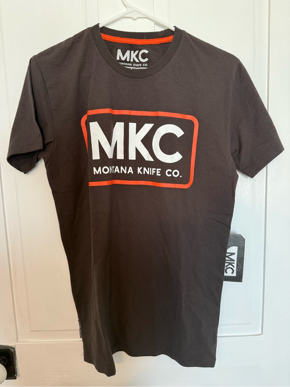 Montana Knife Company Brown Short-Sleeve Tee with Orange-Outlined White Logo